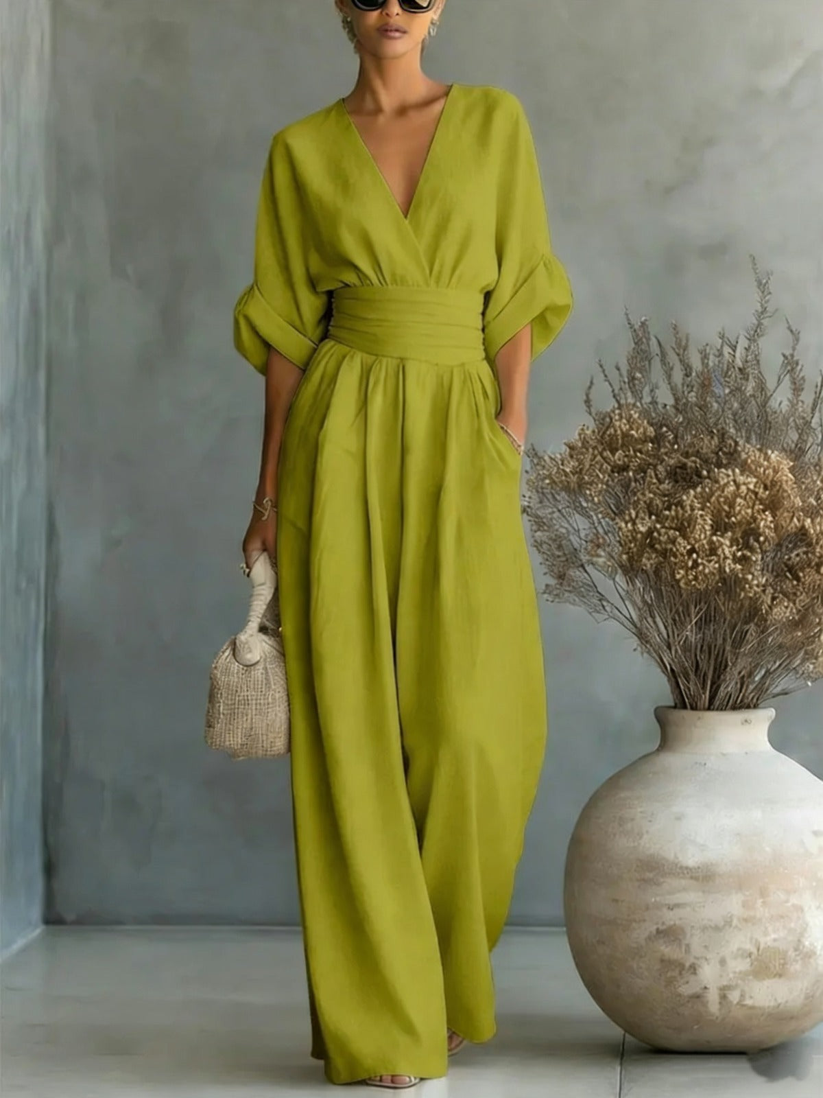 Women's V-neck jumpsuit with wide legs - Elegant and flowing