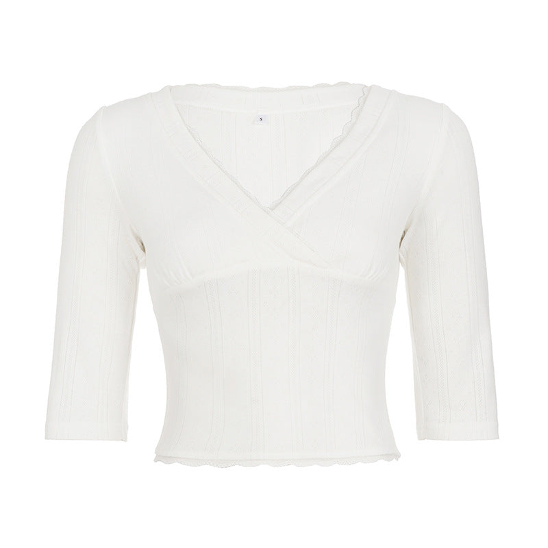Top femenino ajustado liso versátil
