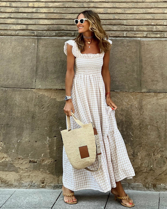 Robe longue élégante à manches smockées