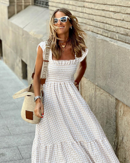Robe longue élégante à manches smockées