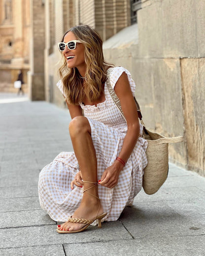 Robe longue élégante à manches smockées