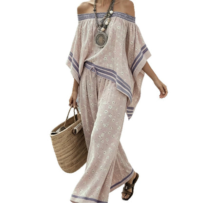 Women's asymmetrical top with one shoulder exposed and wide high-waisted pants - Modern and chic