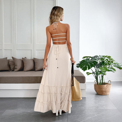 Vestito da donna con collo halter e gonna fluida a volant