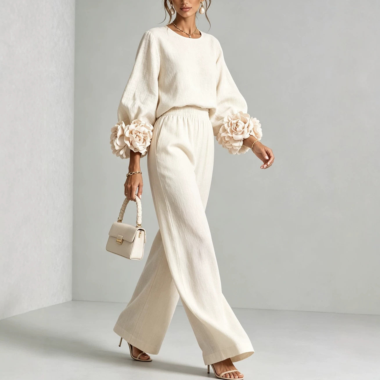 Women's outfit with floral-cuff top and wide-leg trousers – Casual chic