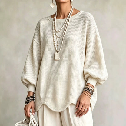 Women's top - Round neck, puff sleeves, and wavy hem