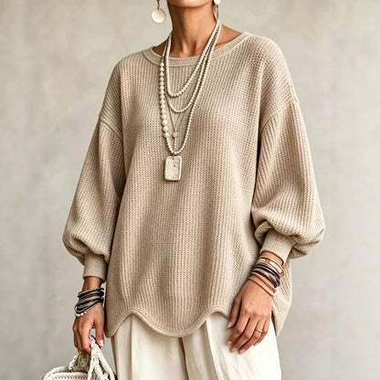 Women's top - Round neck, puff sleeves, and wavy hem