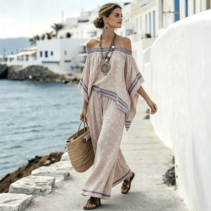 Women's asymmetrical top with one shoulder exposed and wide high-waisted pants - Modern and chic