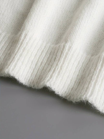 Pull blanc élégant à col en V pour femme – Détails à volants