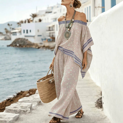 Women's asymmetrical top with one shoulder exposed and wide high-waisted pants - Modern and chic