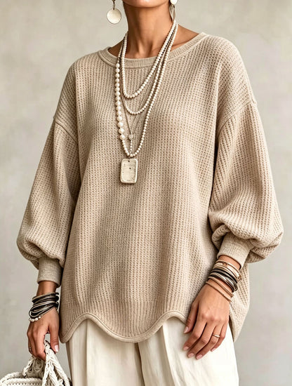 Women's top - Round neck, puff sleeves, and wavy hem