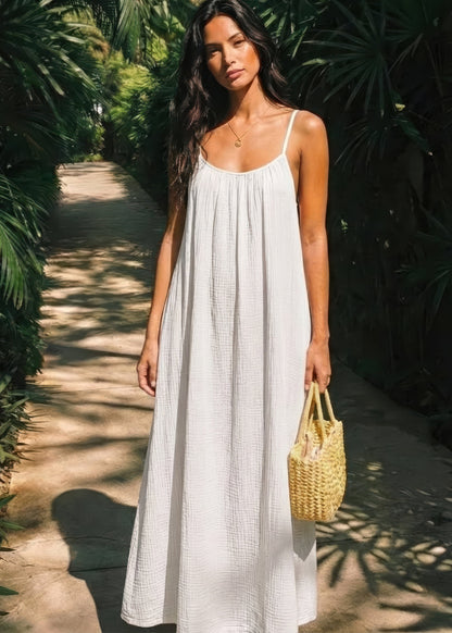 Women's backless dress with thin straps - Flowing and elegant