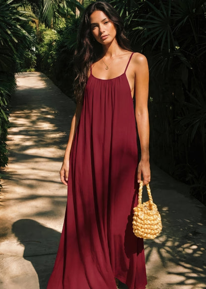Women's backless dress with thin straps - Flowing and elegant