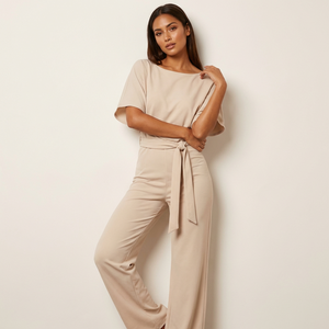 Elegant jumpsuit with waist belt and flowing fit