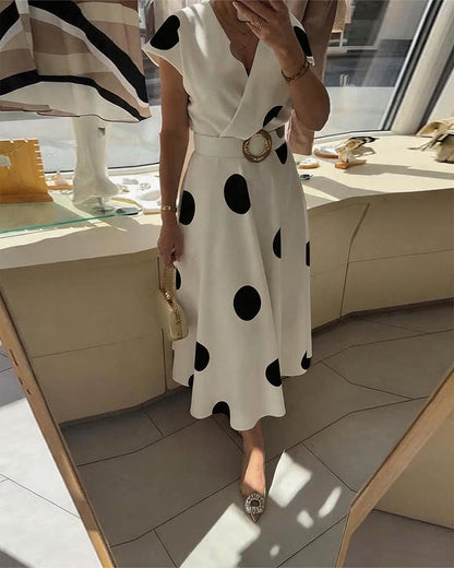 Fitted women's polka dot dress with V-neck - Flattering and feminine