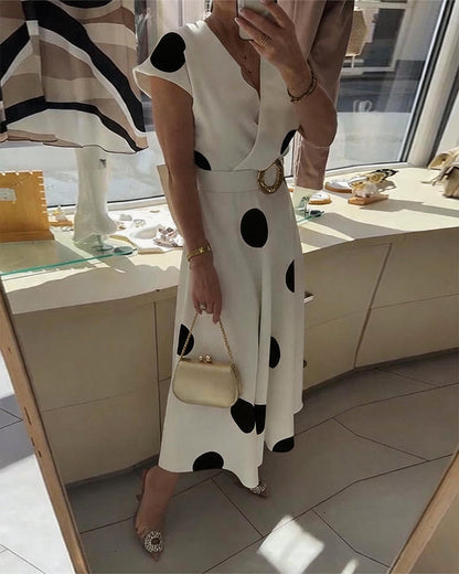 Fitted women's polka dot dress with V-neck - Flattering and feminine