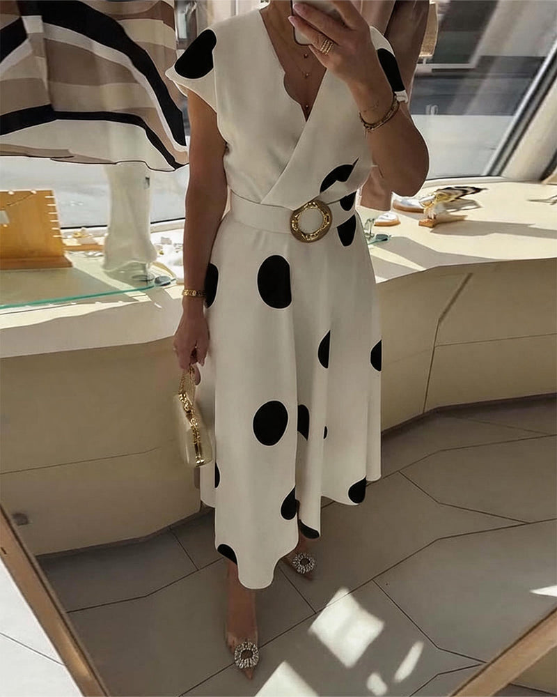 Fitted women's polka dot dress with V-neck - Flattering and feminine