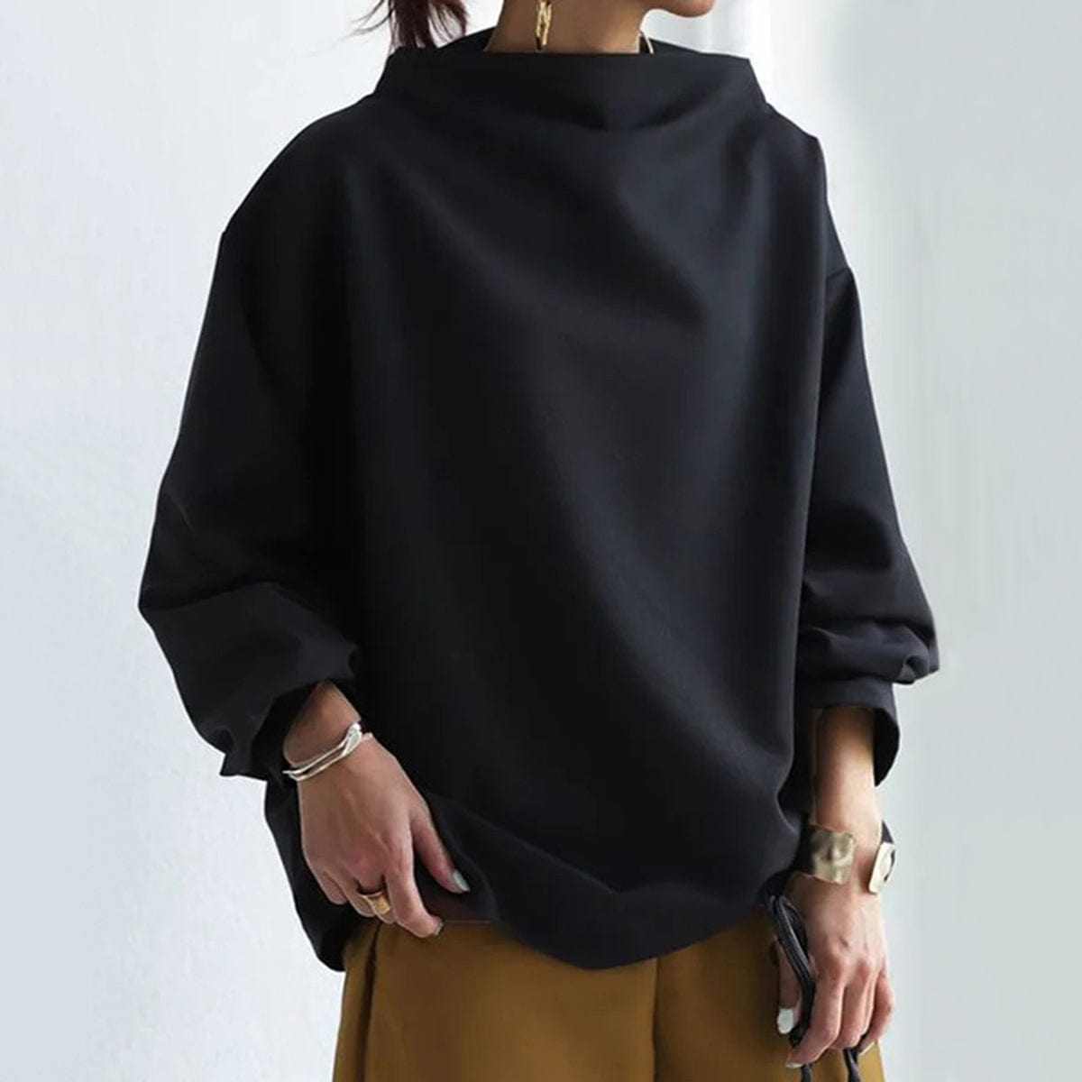Haut en tricot doux à col montant pour femme