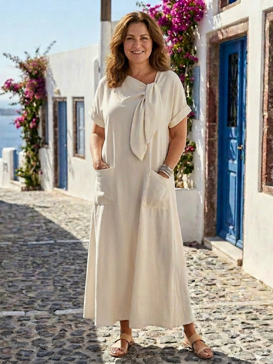 Women's maxi dress with pockets and short sleeves – Round neck and flowing fit