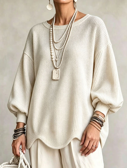 Women's top - Round neck, puff sleeves, and wavy hem