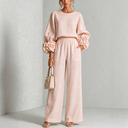 Women's outfit with floral-cuff top and wide-leg trousers – Casual chic