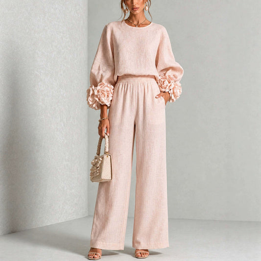 Women's outfit with floral-cuff top and wide-leg trousers – Casual chic