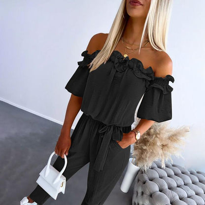 Combinaison femme épaules dénudées – Jumpsuit chic à volants avec taille nouée