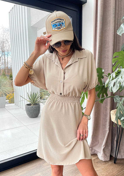 Vestido de mujer con cuello de solapa y cintura marcada