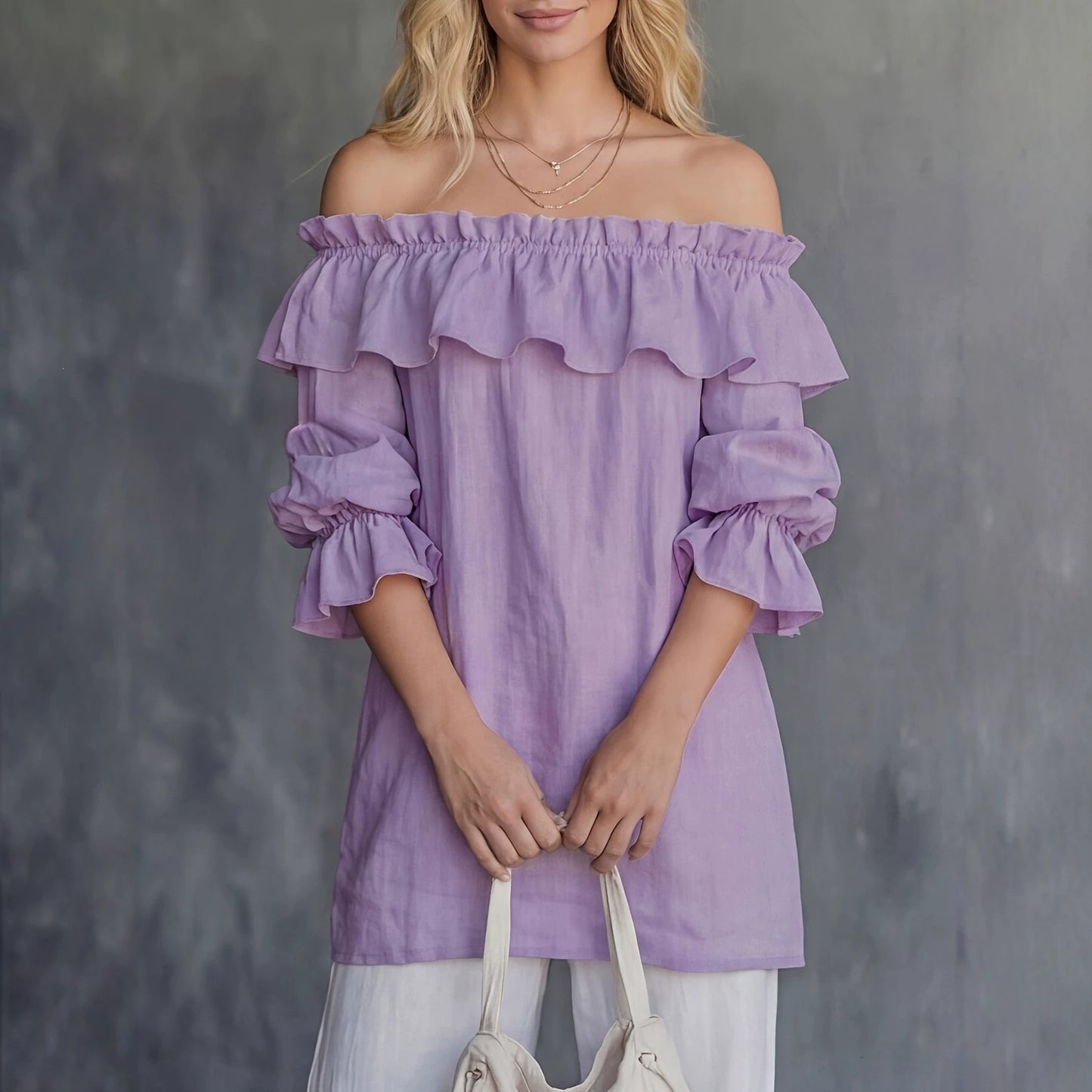 Top femenino asimétrico con volantes y mangas abullonadas - Fluido y elegante
