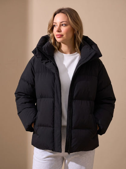 Women's oversized hooded puffer jacket - Warm and modern