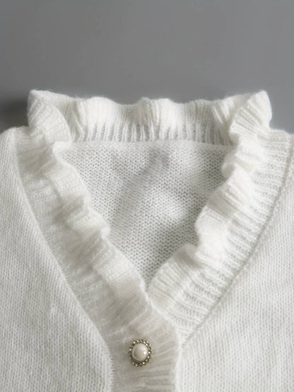 Pull blanc élégant à col en V pour femme – Détails à volants