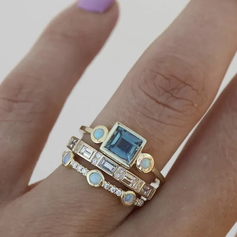 Sæt med blå krystalringe til kvinder i luksusklassen – raffineret og lysende vintagestil.