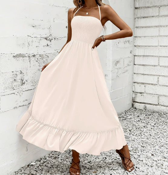 Vestito da donna con collo halter e gonna fluida a volant