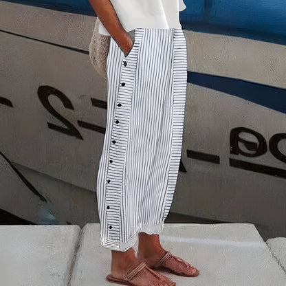 Pantalón de mujer a rayas con botones en contraste - Chic y fluido
