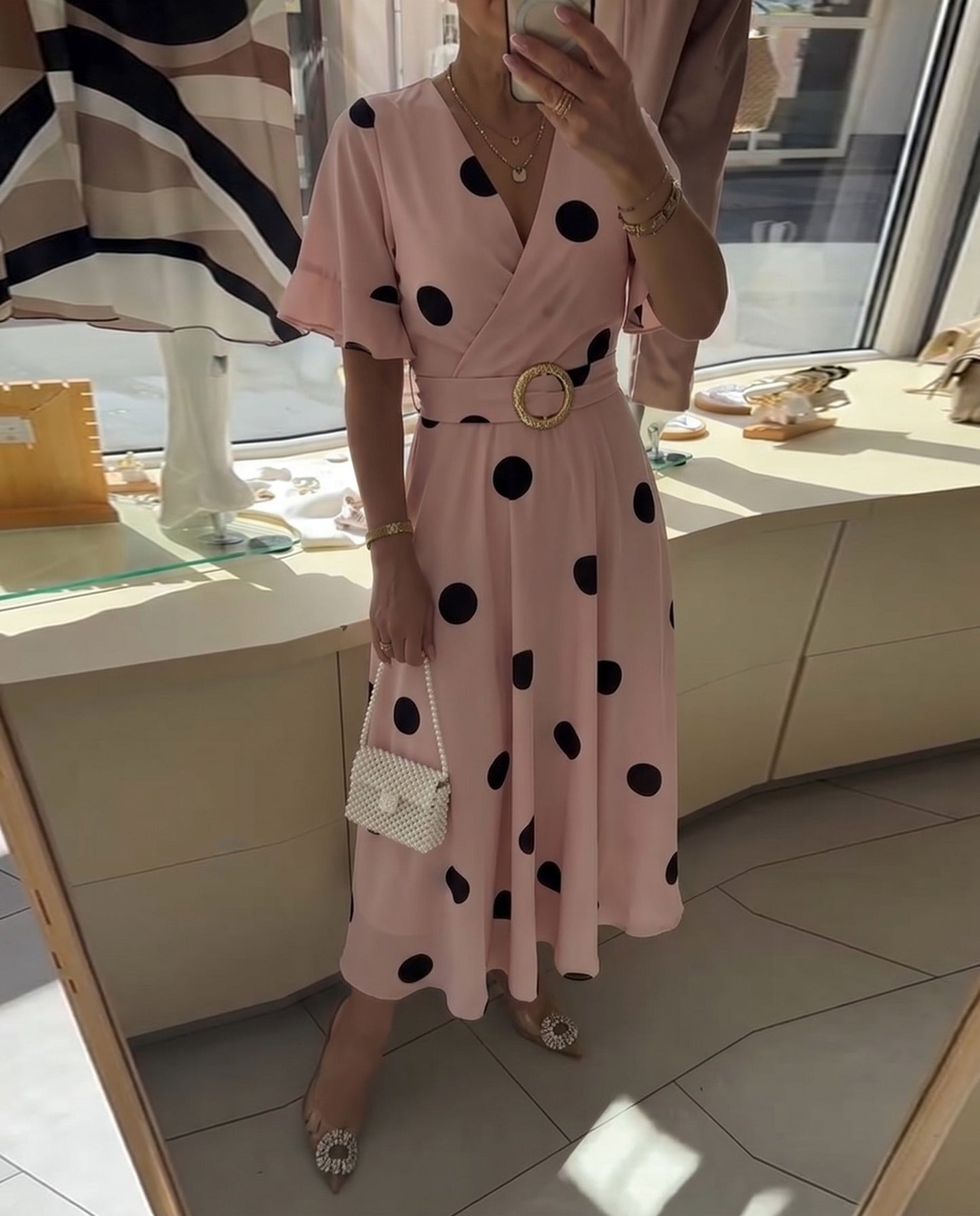 Fitted women's polka dot dress with V-neck - Flattering and feminine