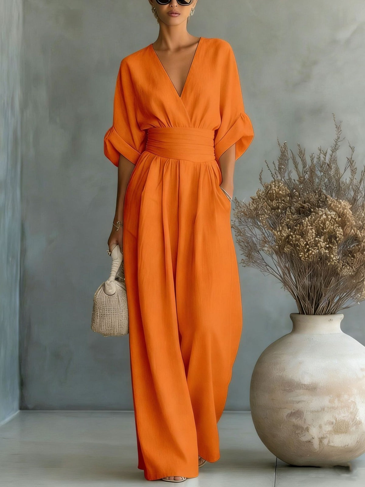 Women's V-neck jumpsuit with wide legs - Elegant and flowing
