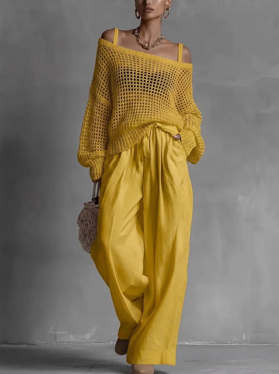 Completo da donna chic a due pezzi, fluido ed elegante