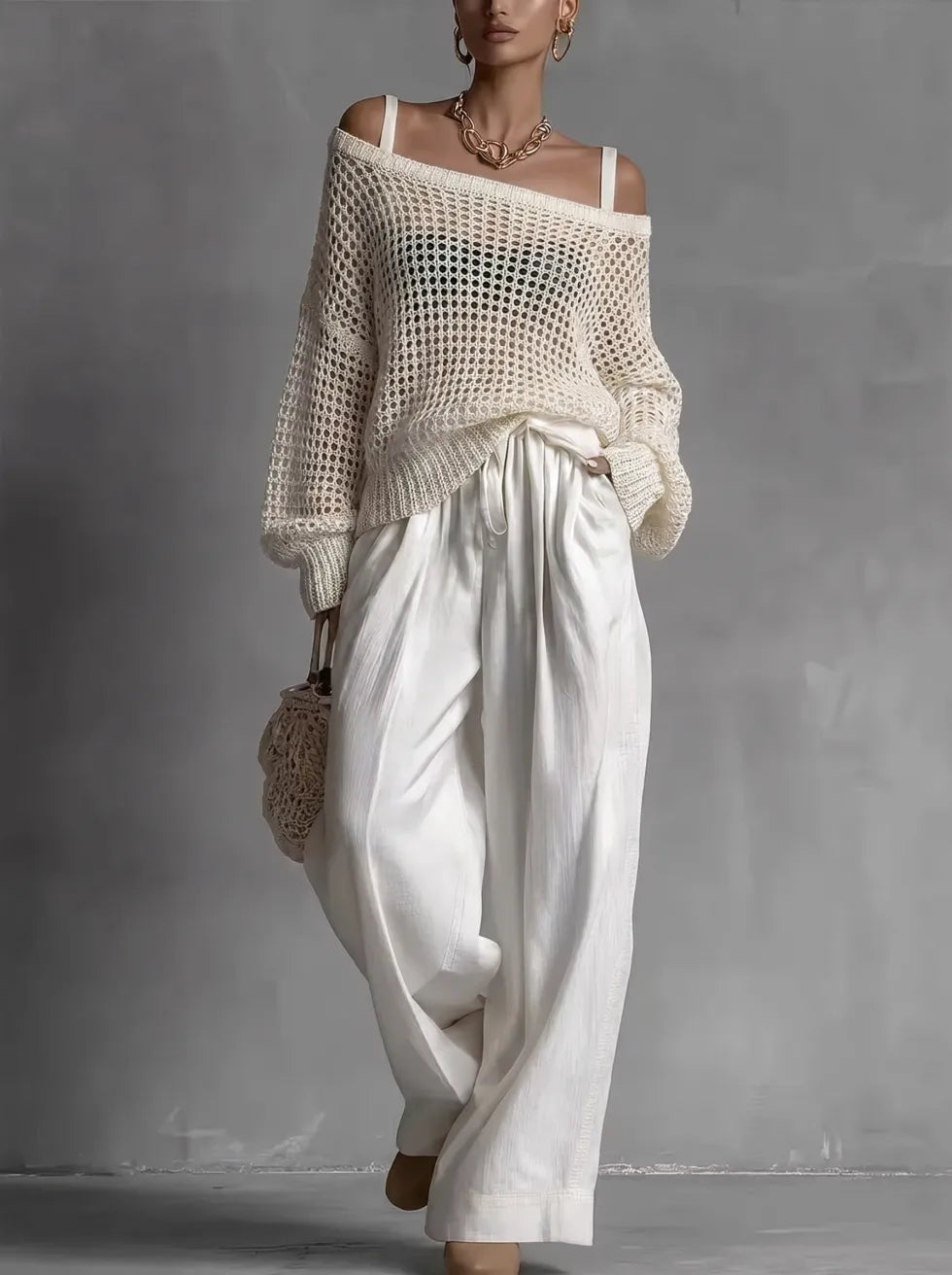 Completo da donna chic a due pezzi, fluido ed elegante
