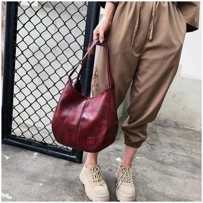 Sac a main femme vintage en cuir souple - Elegant et pratique