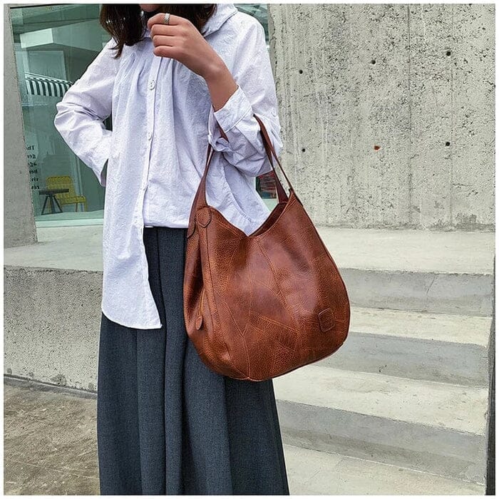 Sac a main femme vintage en cuir souple - Elegant et pratique