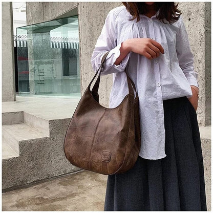 Sac a main femme vintage en cuir souple - Elegant et pratique