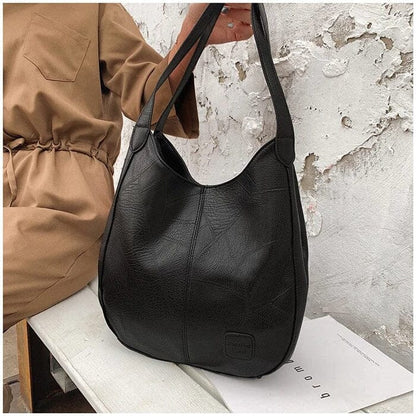 Sac a main femme vintage en cuir souple - Elegant et pratique