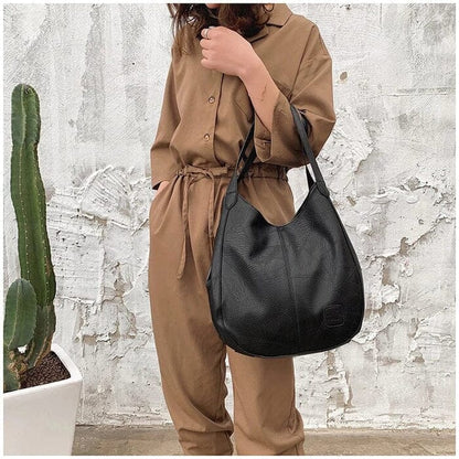 Sac a main femme vintage en cuir souple - Elegant et pratique