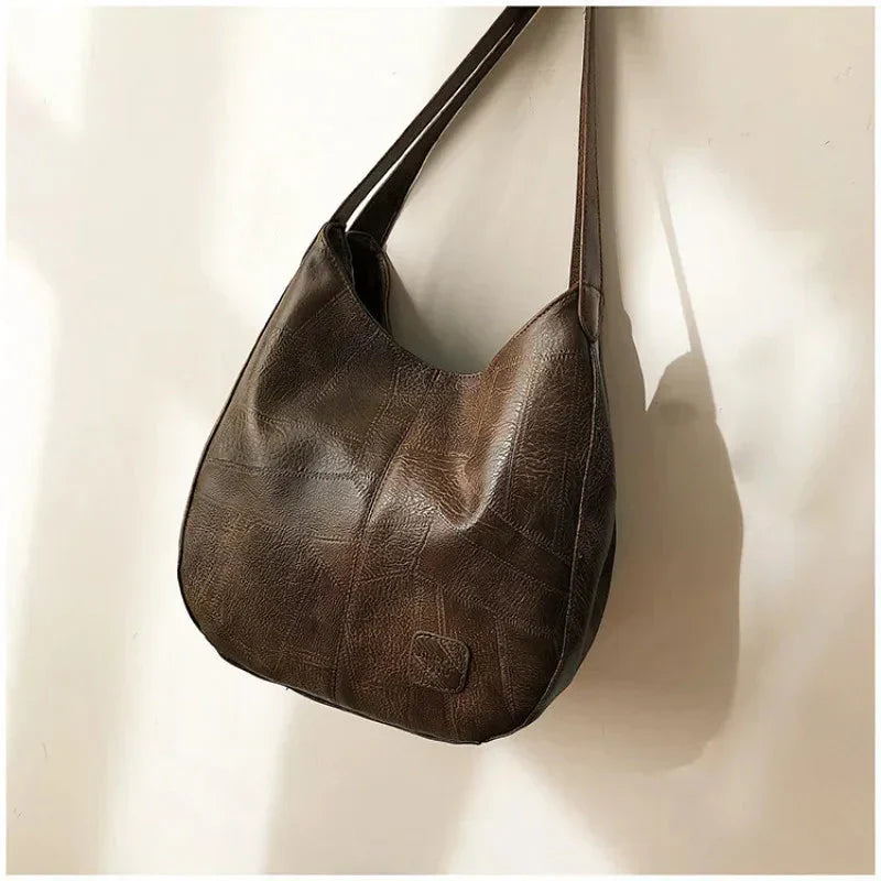 Sac a main femme vintage en cuir souple - Elegant et pratique