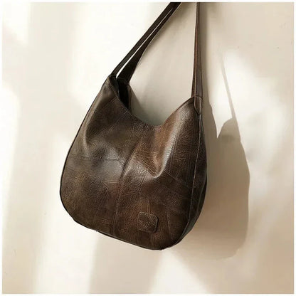 Sac a main femme vintage en cuir souple - Elegant et pratique
