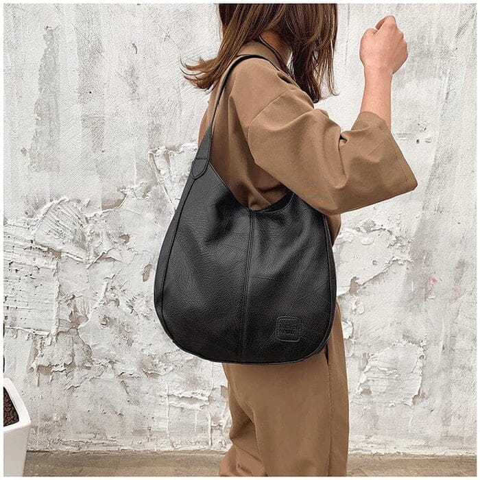 Sac a main femme vintage en cuir souple - Elegant et pratique