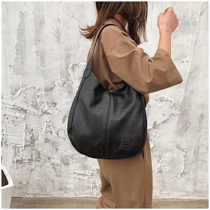 Sac a main femme vintage en cuir souple - Elegant et pratique