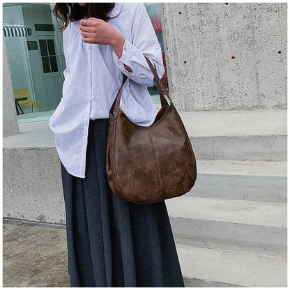 Sac a main femme vintage en cuir souple - Elegant et pratique