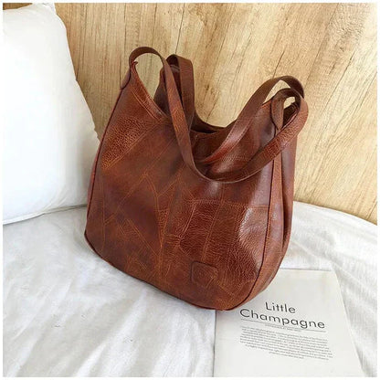 Sac a main femme vintage en cuir souple - Elegant et pratique