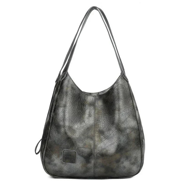 Sac a main femme vintage en cuir souple - Elegant et pratique