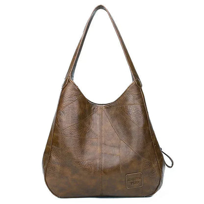Sac a main femme vintage en cuir souple - Elegant et pratique